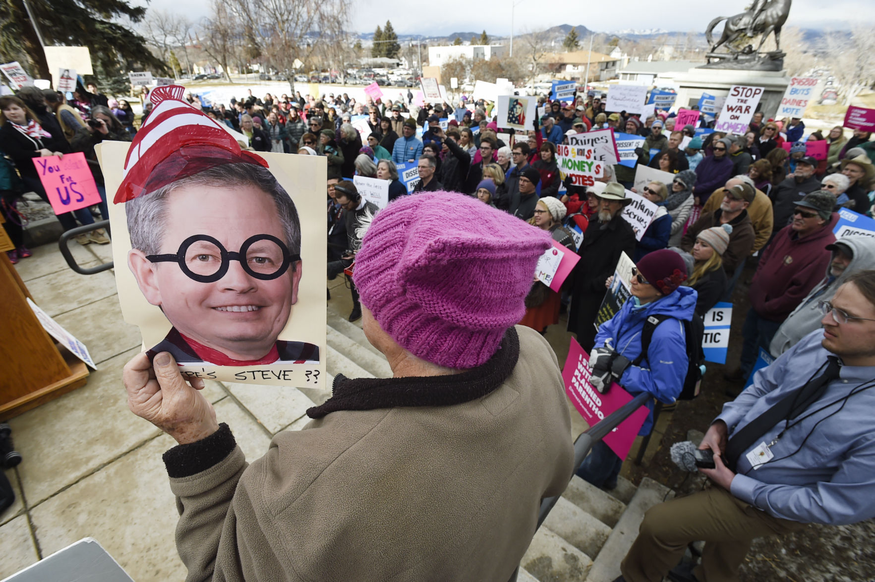 Hundreds of protesters gather to "Bring the Town Hall to Steve Daines"